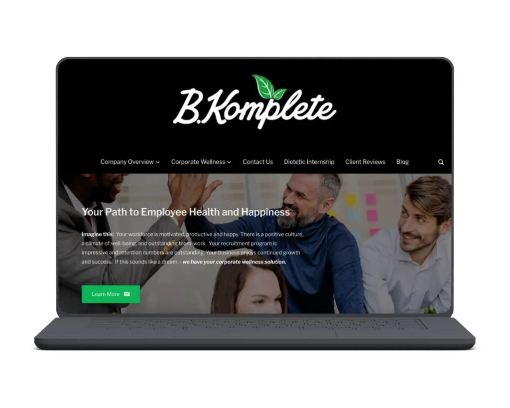 Laptop mock-up of Corporate Wellness Website, B.Komplete